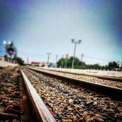 Railway tracks against clear sky