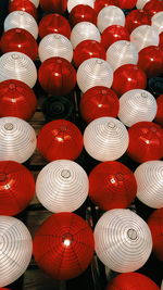 Low angle view of illuminated lanterns hanging at ceiling