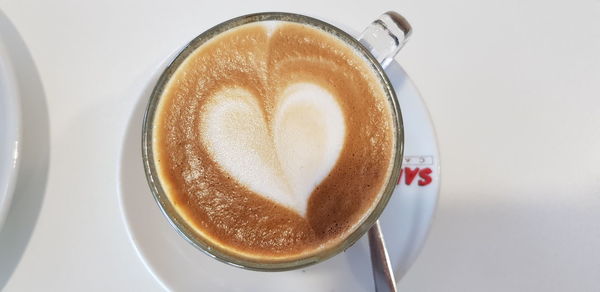 High angle view of cappuccino on table