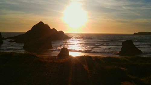 Scenic view of sea at sunset