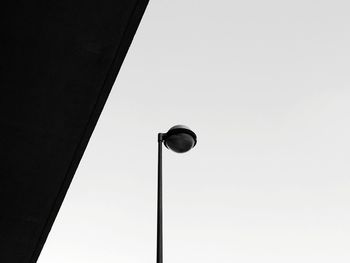Low angle view of lamp against clear sky