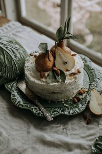 Cake decorated with pears and almonds