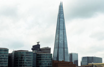 Low angle view of skyscrapers against sky