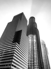 Low angle view of modern buildings against sky