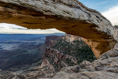 Rock formations in mountains at mesa arch