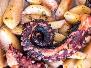 High angle view of meat on barbecue
