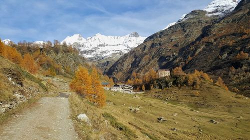 Panoramic view of snowcapped mountains against sky