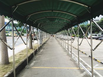 Covered walkway amidst road