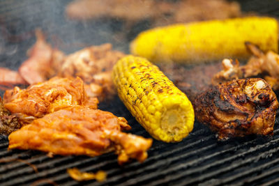 Close-up of meat on barbecue grill