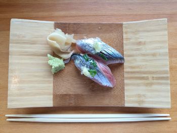 High angle view of vegetables on cutting board