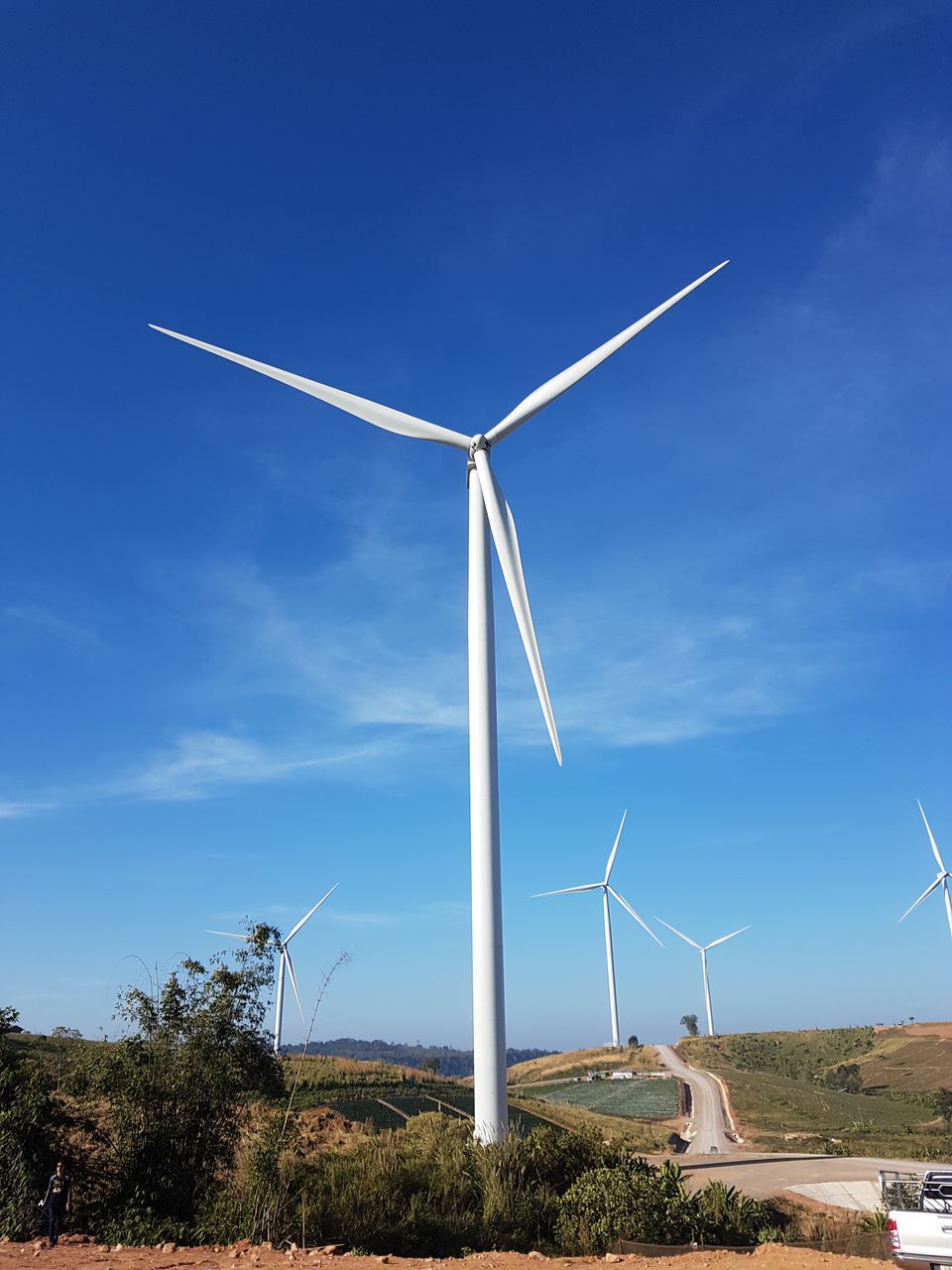 renewable energy, alternative energy, environmental conservation, wind turbine, turbine, fuel and power generation, wind power, sky, environment, blue, nature, plant, tree, landscape, day, land, no people, technology, rural scene, field, sustainable resources, power supply