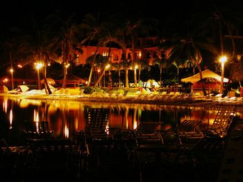 Illuminated bridge at night