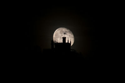 Silhouette of historical building at night