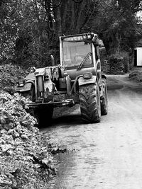 Abandoned tractor in forest