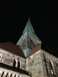 Low angle view of church at night