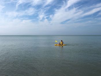 Boat in sea against sky