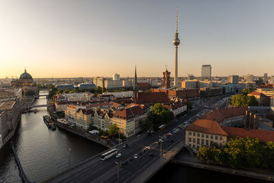 High angle view of city buildings during sunset