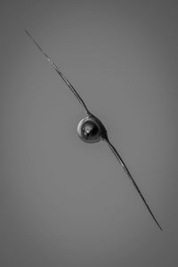 Low angle view of security camera against clear sky