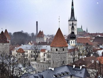  view of church against cloudy sky in winter