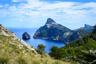 Scenic view of cabo formentor by sea against sky