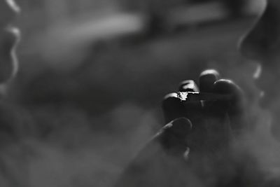 Close-up of hand holding camera