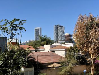 Buildings against blue sky