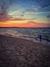 Scenic view of sea at sunset