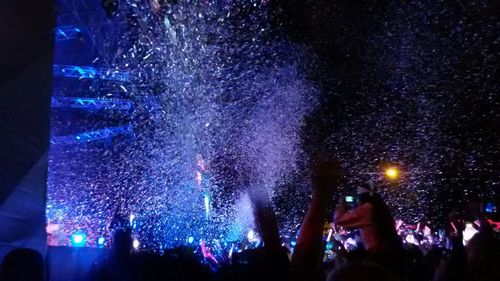 Firework display at night