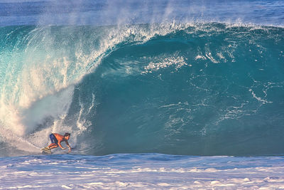 Man surfing in sea