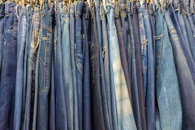 Full frame shot of clothes hanging at market