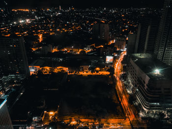 High angle view of illuminated buildings at night