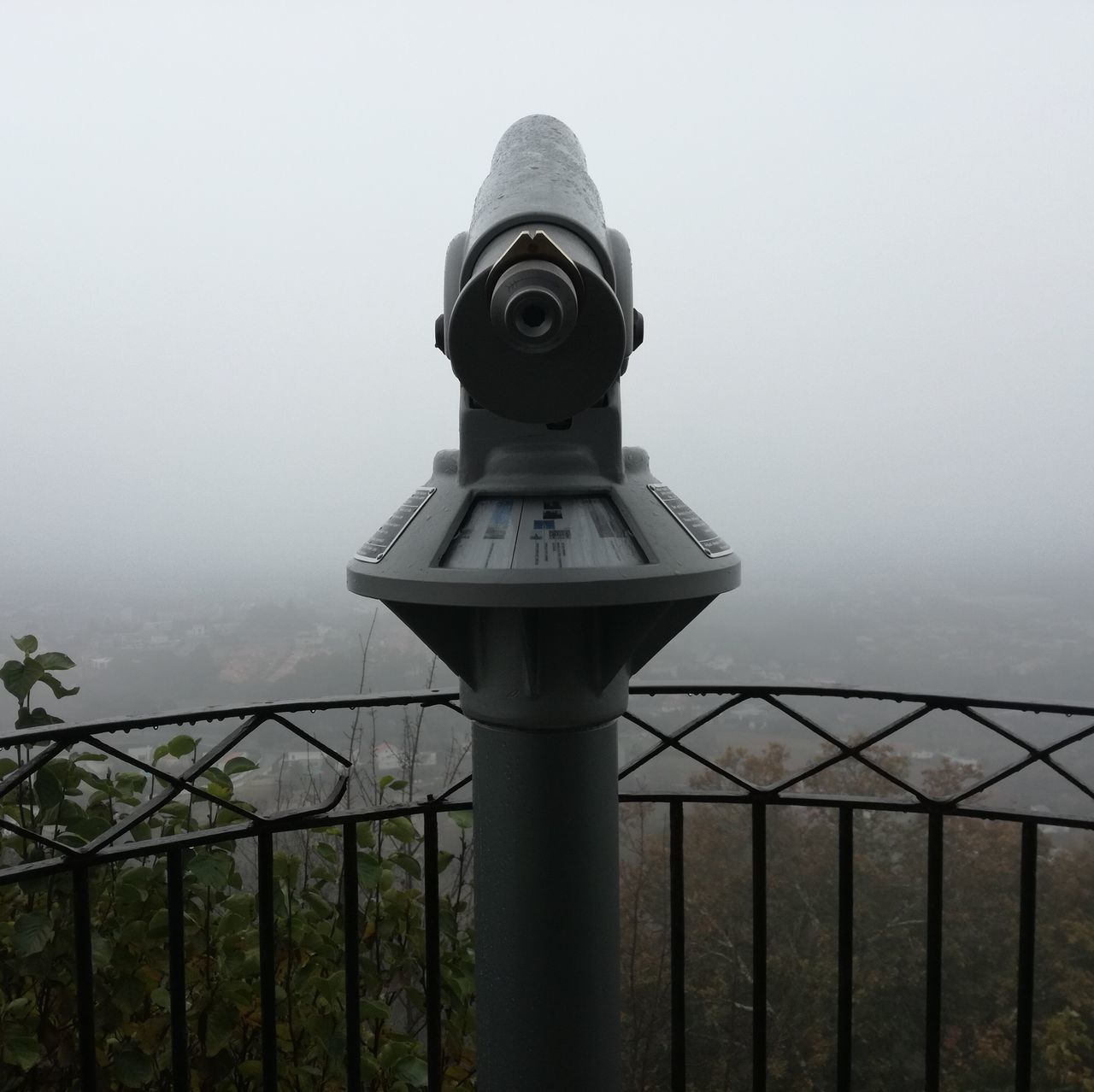 coin operated, coin-operated binoculars, binoculars, hand-held telescope, fog, surveillance, metal, railing, telescope, no people, outdoors, day, architecture, built structure, travel destinations, building exterior, water, sky, close-up, cityscape, city, scenics, nature, technology