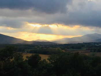 Scenic view of landscape against sky during sunset