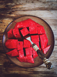 High angle view of chopped strawberries on table