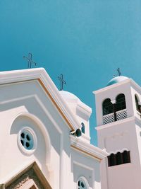 Low angle view of church against blue sky