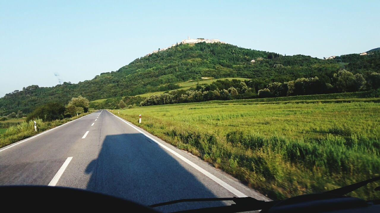 ROAD PASSING THROUGH LANDSCAPE