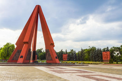 Red structure against sky