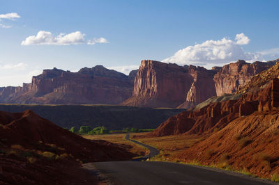 Scenic view of mountain road against sky