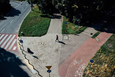 High angle view of people walking on street in city