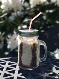 Close-up of milkshake on table