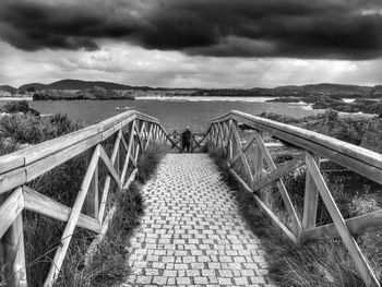 View of road against cloudy sky