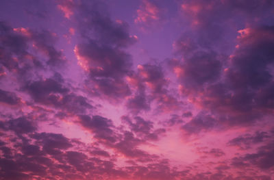 Low angle view of dramatic sky during sunset