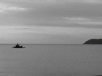 Boat sailing in sea