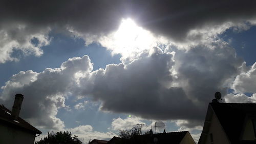 Low angle view of smoke against sky