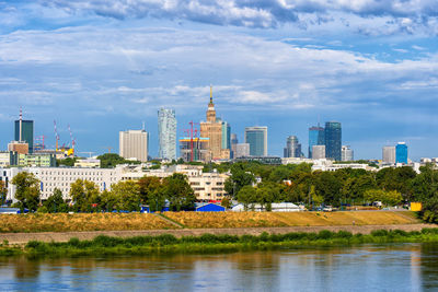 Modern buildings in city against sky