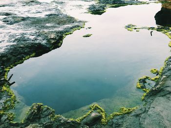 Close-up of rocks in lake