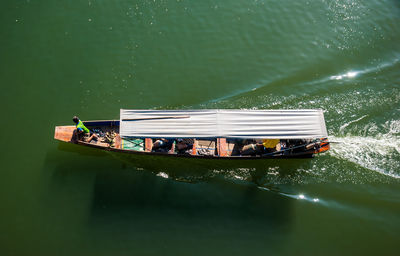 High angle view of boats moving in lake