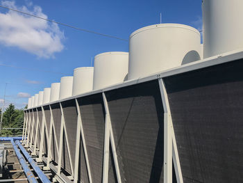 Low angle view of factory against sky