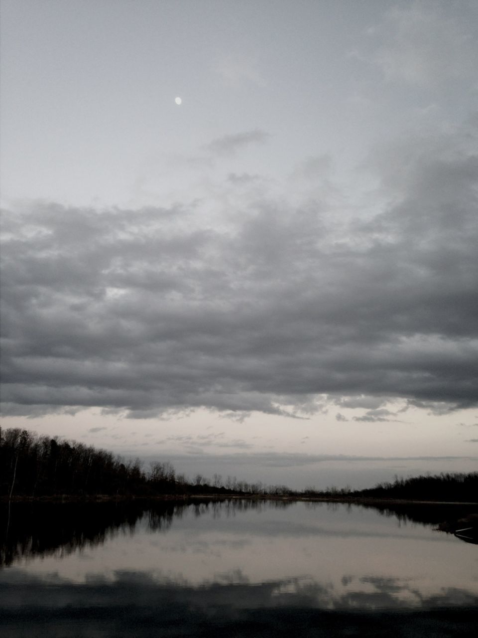 water, tranquil scene, tranquility, reflection, lake, sky, scenics, beauty in nature, cloud - sky, waterfront, nature, cloudy, idyllic, weather, cloud, calm, non-urban scene, standing water, river, outdoors