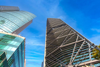 Low angle view of modern buildings against sky